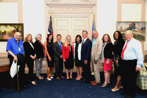 Treasurer Davis and representatives from AARP with Jean Chatzky and Governor Carney
